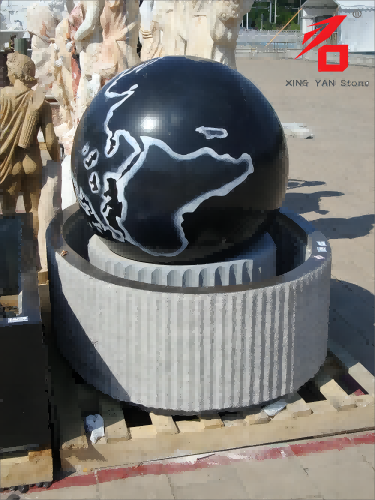 Brunnen mit Granitball